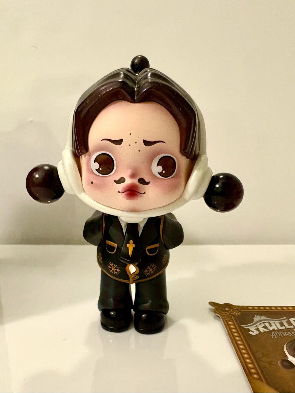 Gomez from the Skullpanda collab w/ the Addams Family from Pop Mart